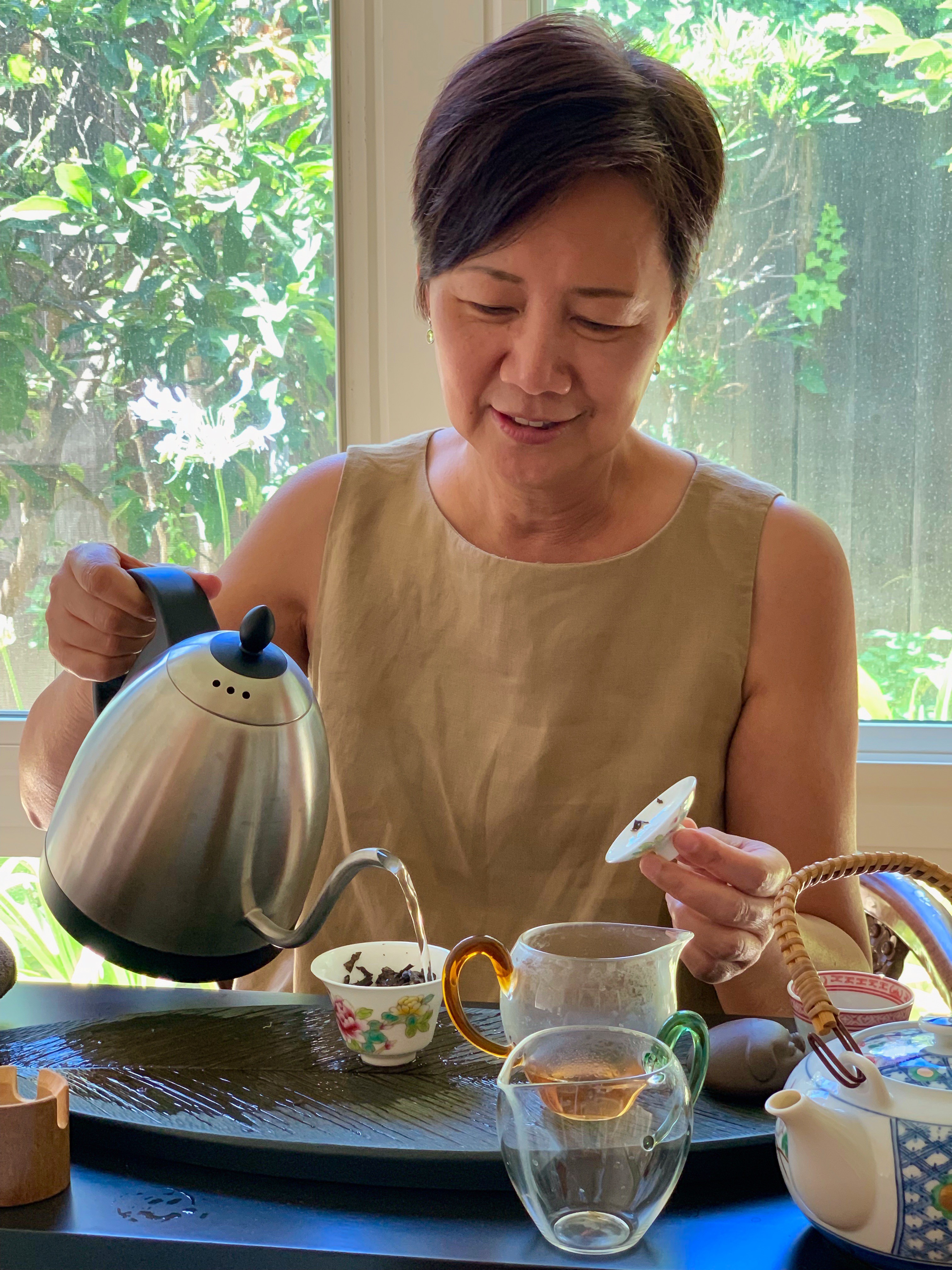Linda pouring tea