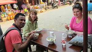 We ate on the sidewalk outside of a rice noodle shop